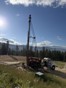 Water well drilling rig set up on a rural Idaho property