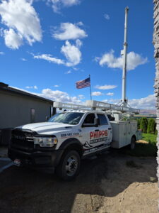 Phipps Water Solutions well pump service truck at an Idaho home